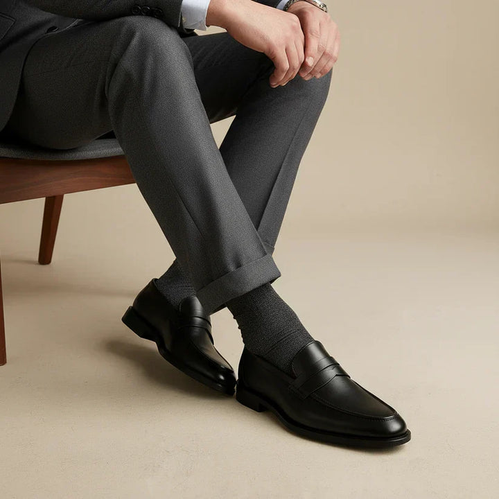 Men's slip-on penny loafers with rounded toes and low heels
