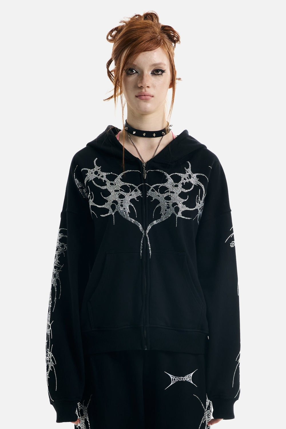 Black hooded zip hoodie with silver rhinestone thorn and wing graphics