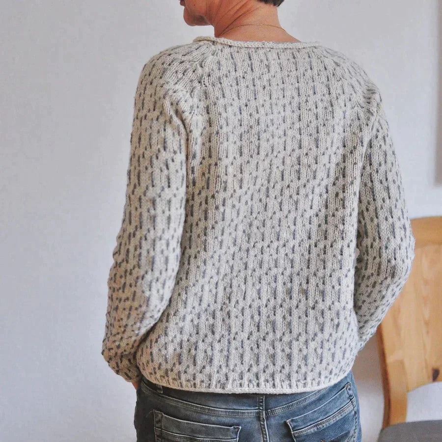 Women's gray textured knit sweater with crew neckline and long sleeves