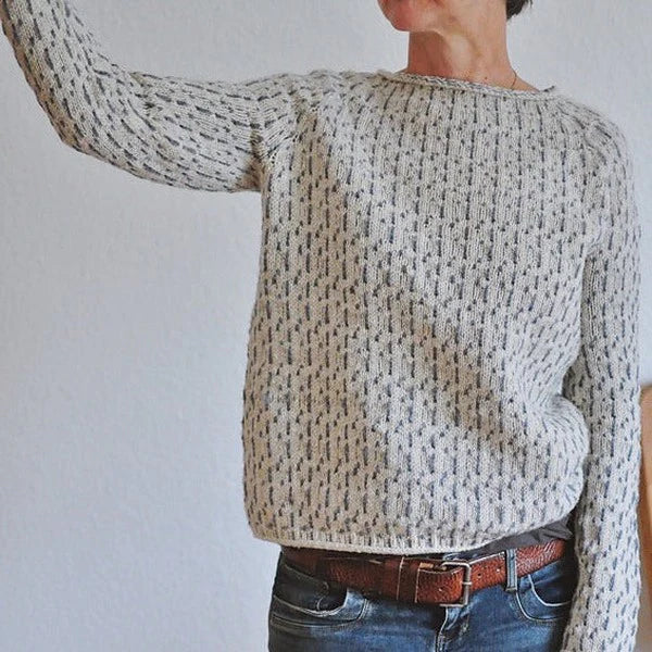 Women's gray textured knit sweater with crew neckline and long sleeves