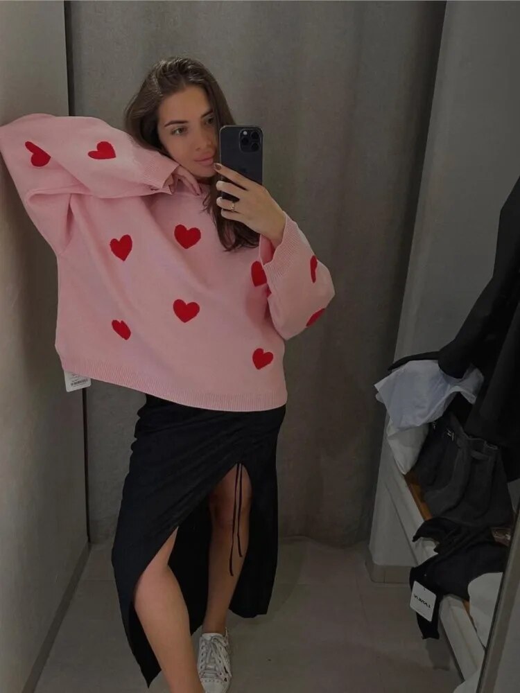 Women's patterned knit sweater with crew neck, long sleeves and contrasting motifs