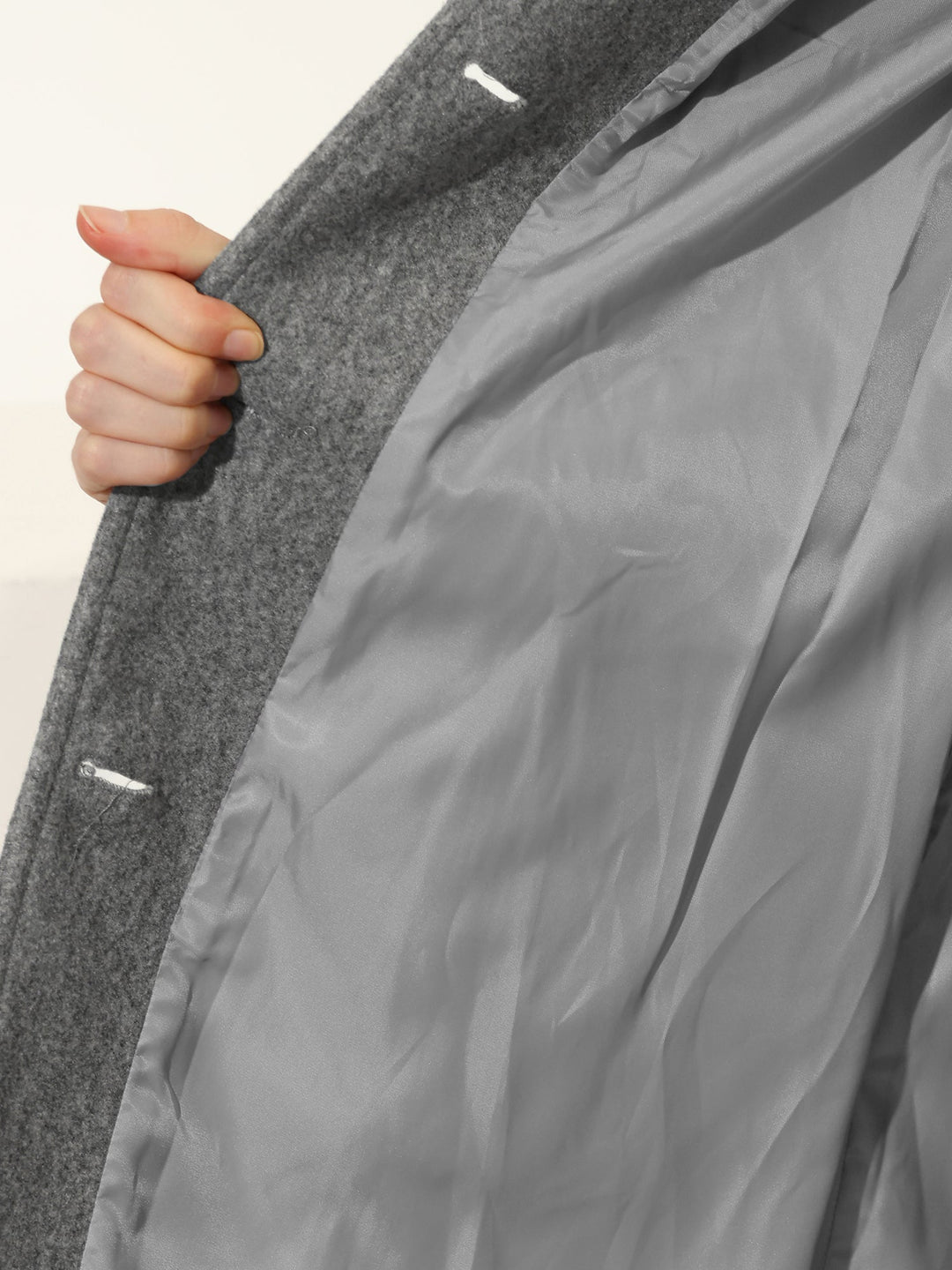 Women's single-breasted longline coat with notched collar and button front