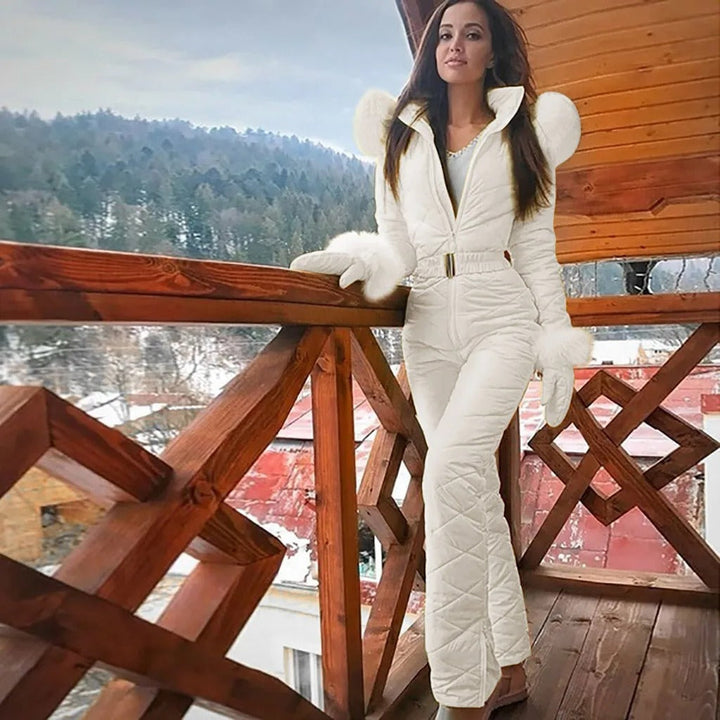 Women's quilted ski jumpsuit with belt and high collar