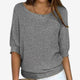 Women's textured knit sweater with round neckline and three-quarter sleeves