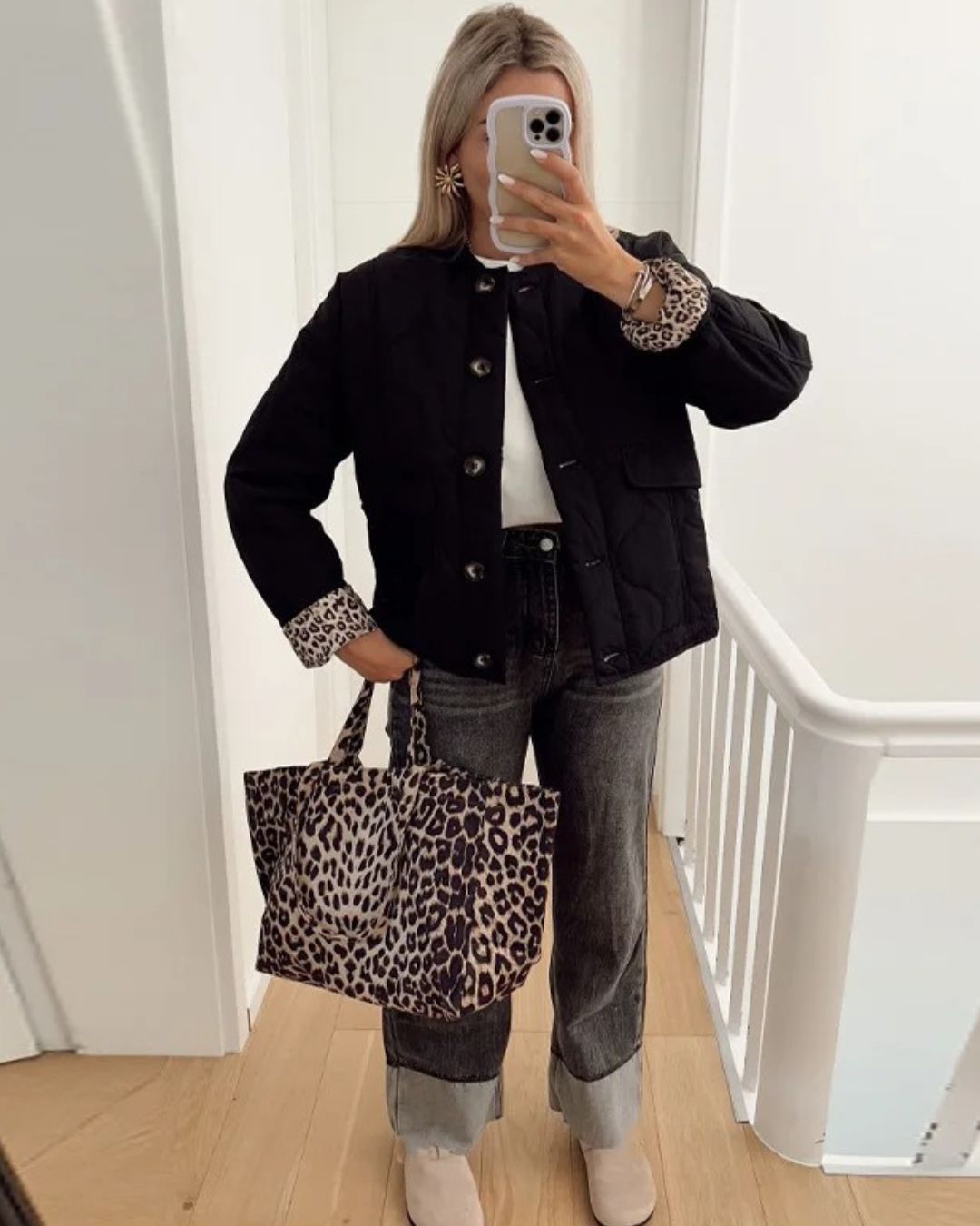 Women's quilted jacket with button front and animal-print cuffs