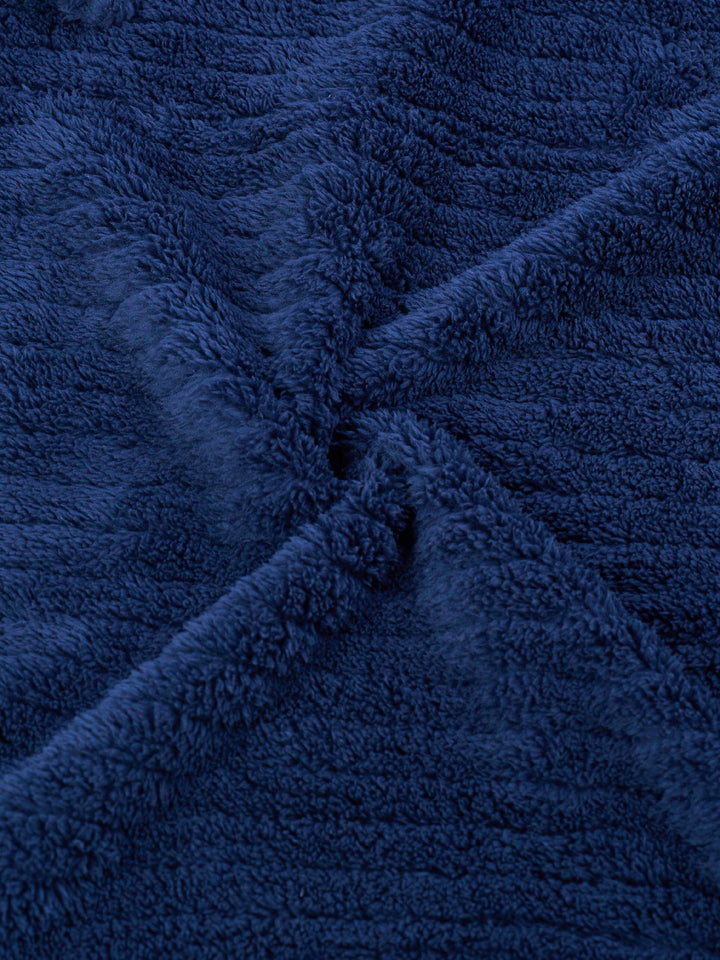 Navy blue full-length fleece dressing gown with shawl collar and tie belt