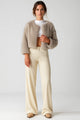 Women's short plush-textured jacket with long sleeves and open front