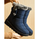 Tall winter boots with textured trim and thick flat soles