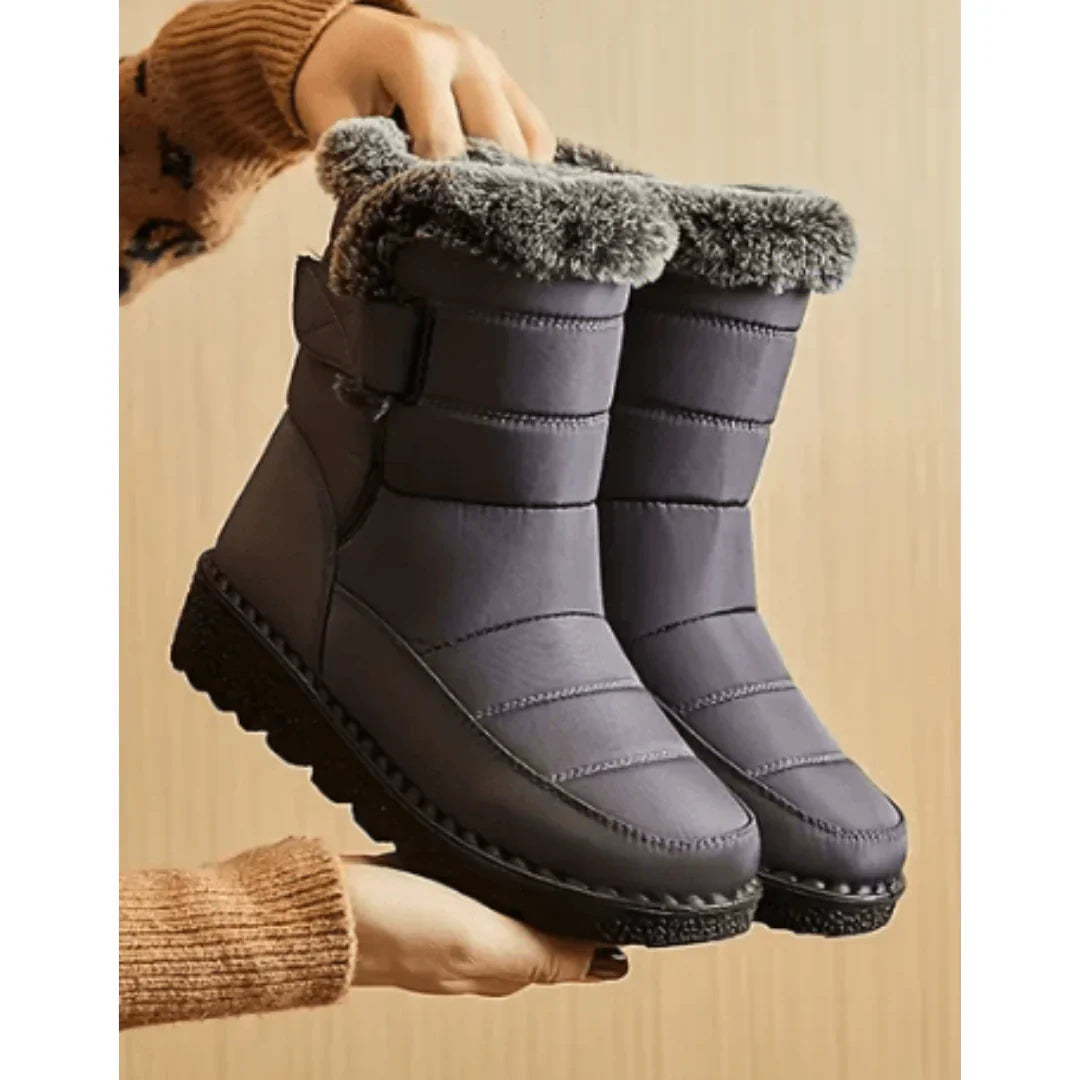 Tall winter boots with textured trim and thick flat soles