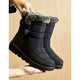 Tall winter boots with textured trim and thick flat soles
