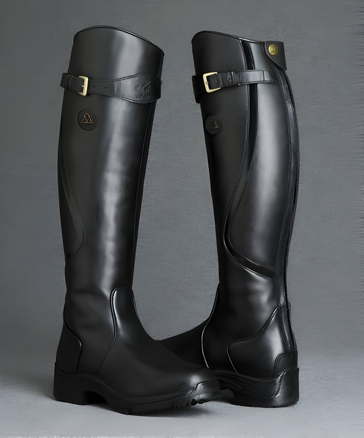 Women's tall riding boots with buckle strap and lugged sole