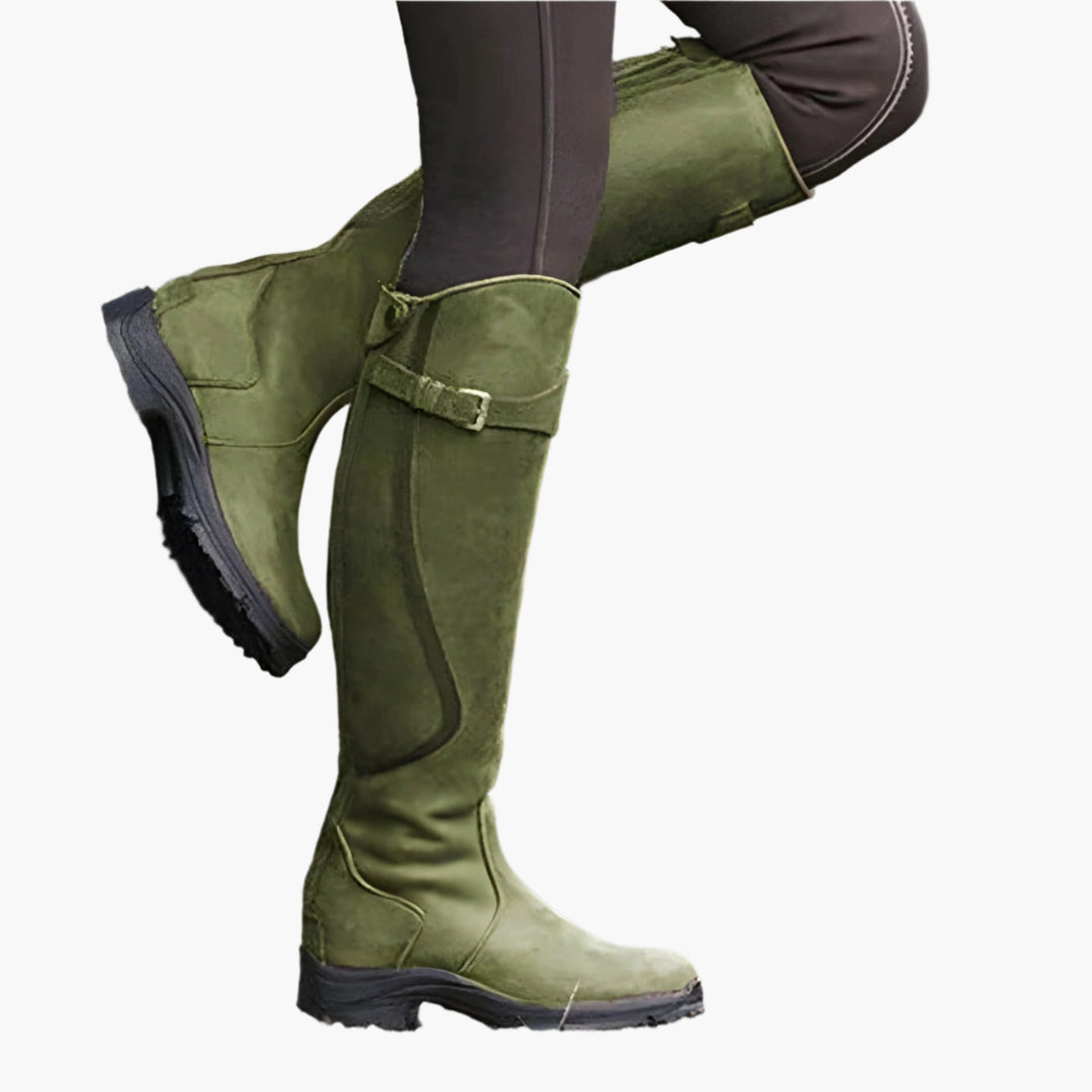 Women's tall riding boots with buckle strap and lugged sole