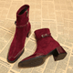 Square toe heeled ankle boots with buckle straps and side zippers
