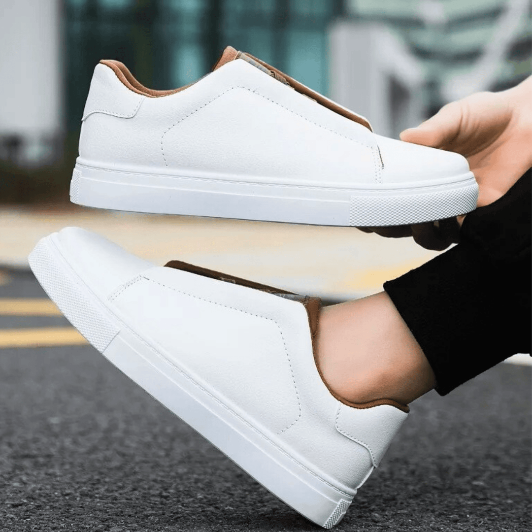 Low-top panelled sneaker with lace-up front and flat sole