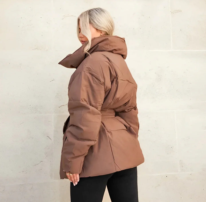 Women's quilted belted puffer parka with high collar and long sleeves