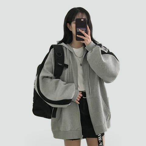 Women's relaxed zip-front hooded hoodie with long sleeves and large front pockets