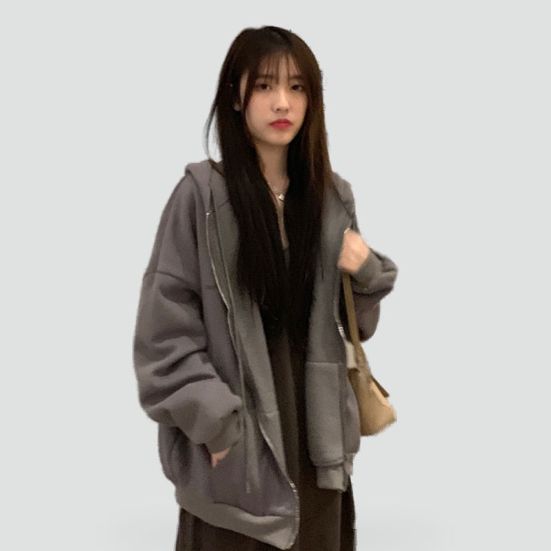 Women's relaxed zip-front hooded hoodie with long sleeves and large front pockets