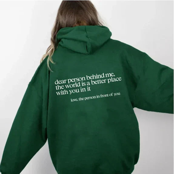 Women's relaxed hooded sweatshirt with contrasting text graphic on the back