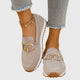 Women's textured knit loafers with gold buckle detail and cushioned sole, shown in blue and beige.