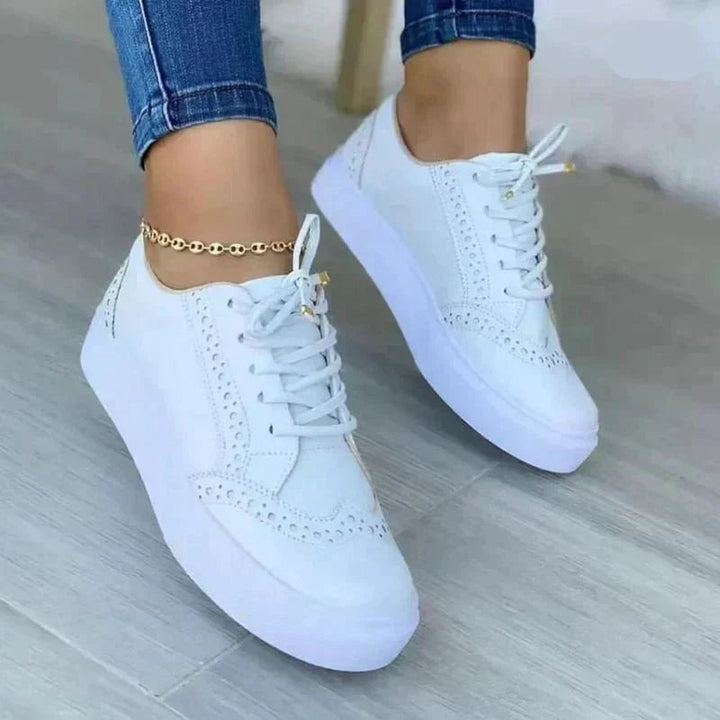 Women's lace-up brogue sneakers with raised white sole