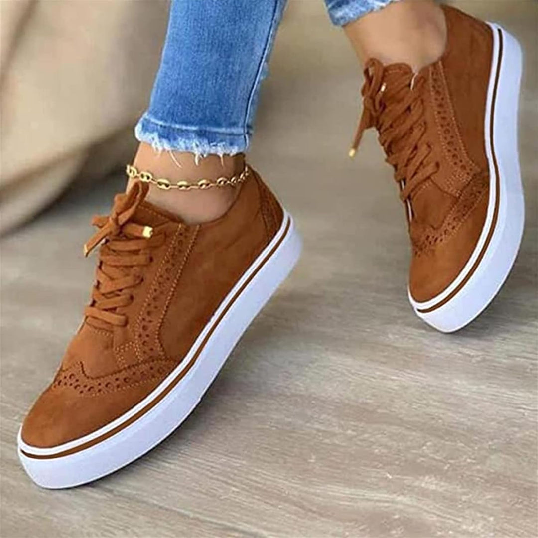 Women's lace-up brogue sneakers with raised white sole