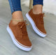 Women's lace-up brogue sneakers with raised white sole