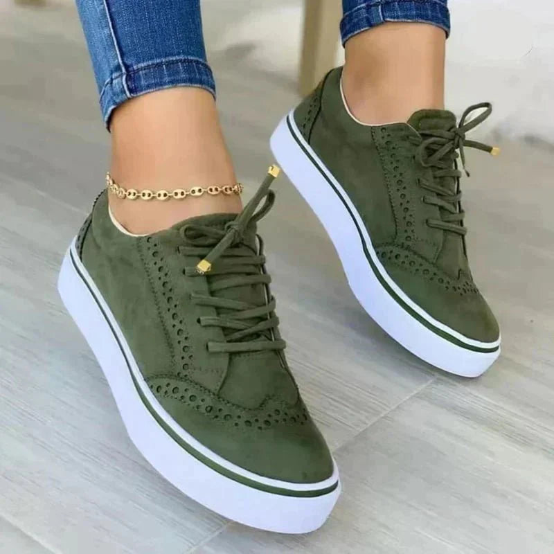 Women's lace-up brogue sneakers with raised white sole