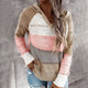Women's hooded striped knit sweater with long sleeves and ribbed cuffs