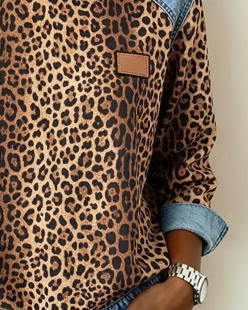 Women's leopard print sweatshirt with denim-style patchwork trim and long sleeves