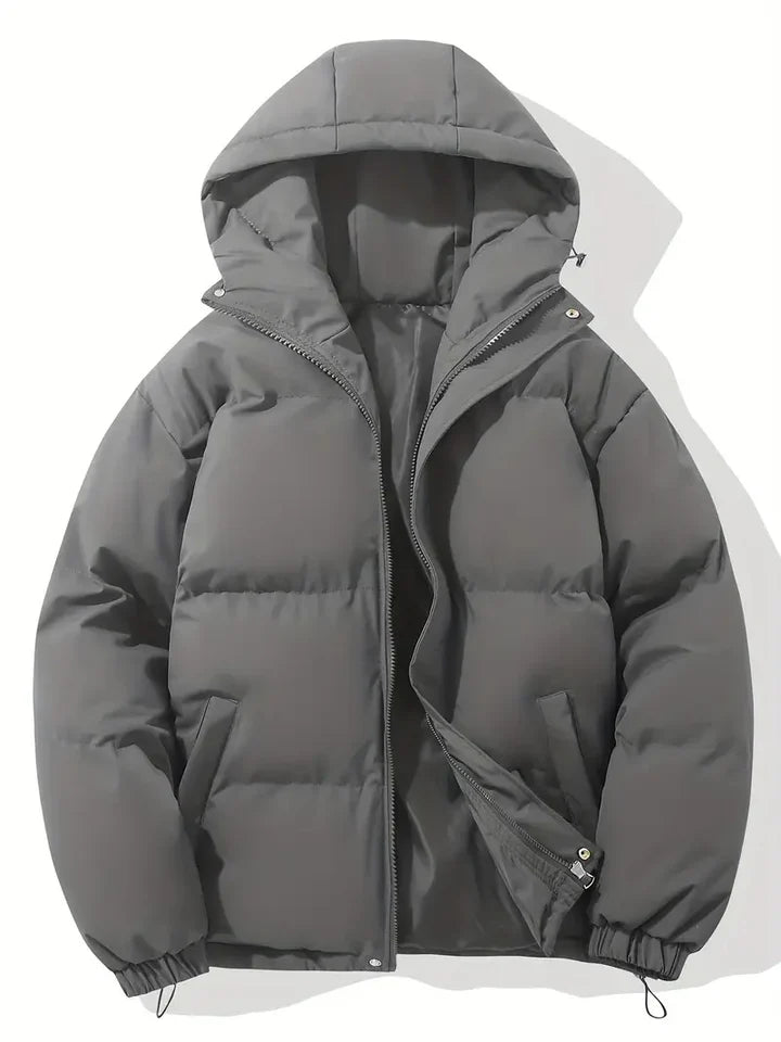 Women's hooded quilted puffer jacket with zip front and adjustable hem