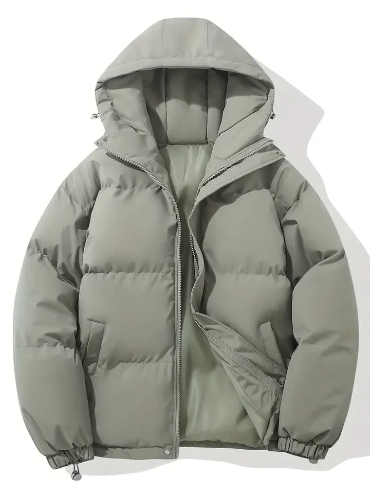 Women's hooded quilted puffer jacket with zip front and adjustable hem