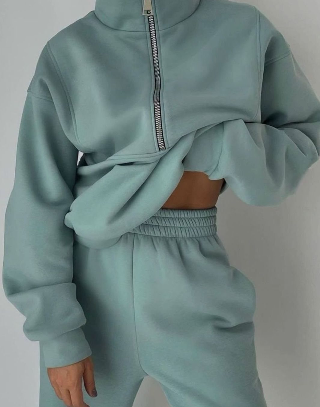 Women's cropped zip sweatshirt tracksuit set with mock neck and matching bottom