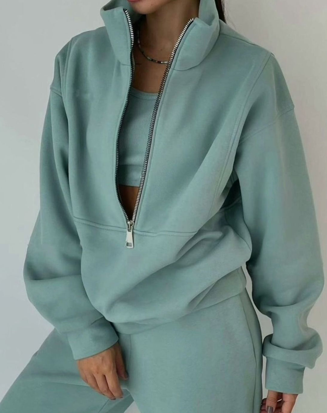 Women's cropped zip sweatshirt tracksuit set with mock neck and matching bottom