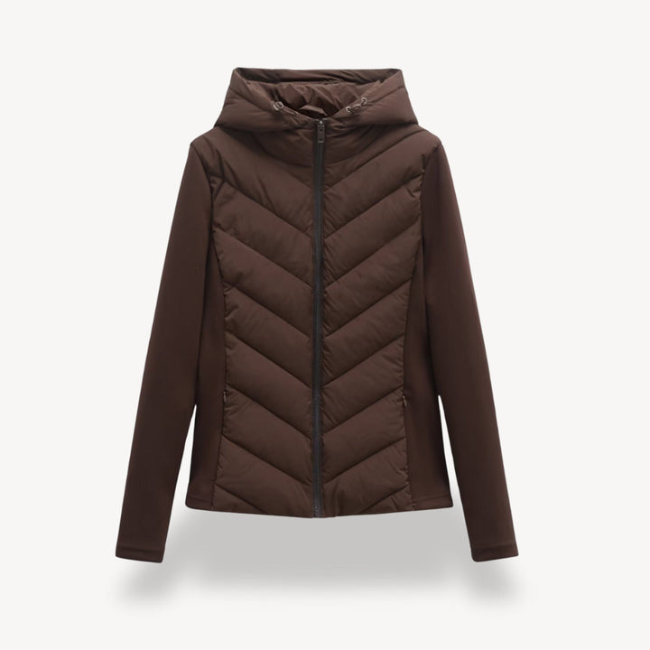 Women's hooded quilted jacket with chevron front, long sleeves and zip fastening