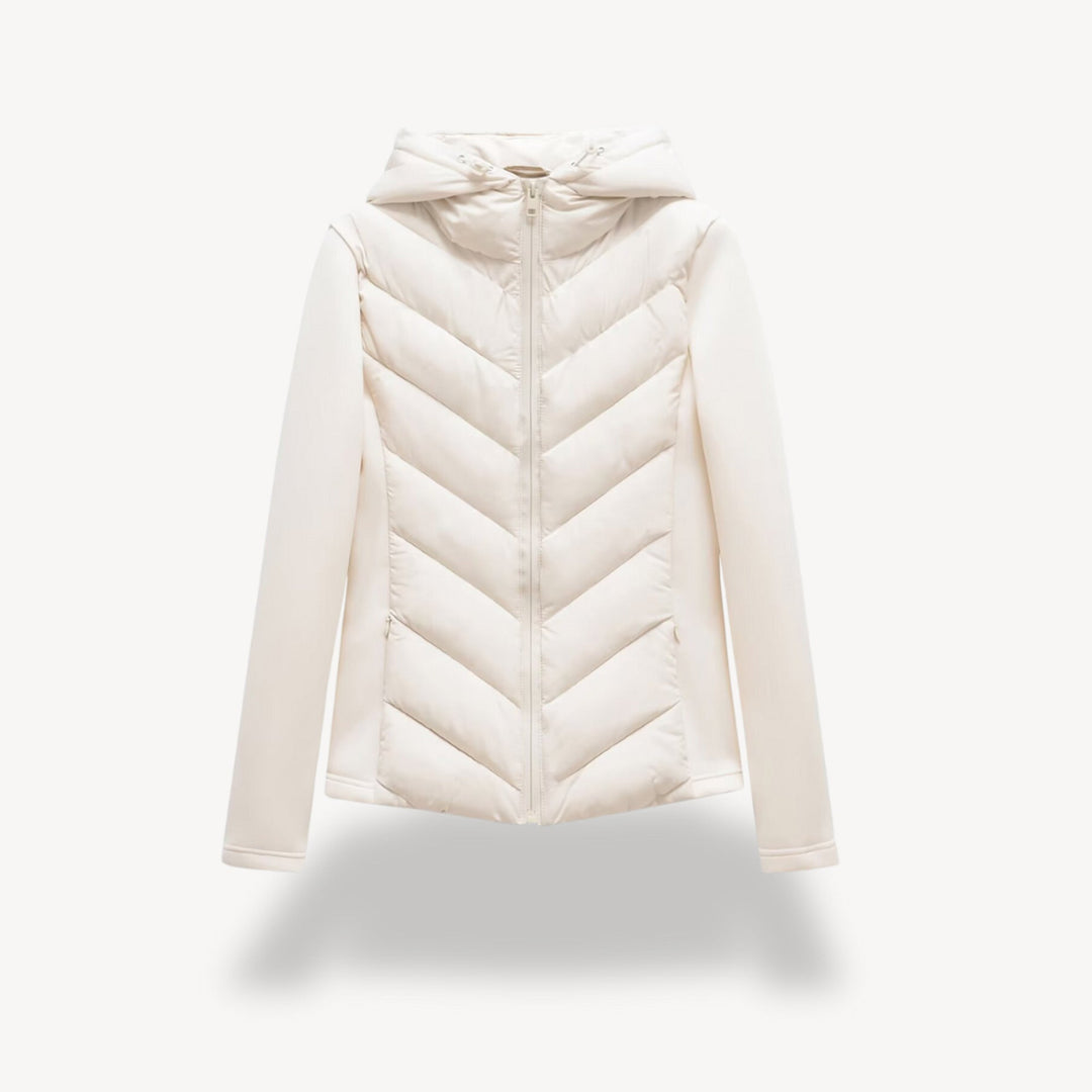 Women's hooded quilted jacket with chevron front, long sleeves and zip fastening