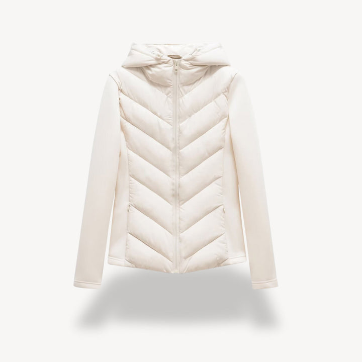 Women's hooded quilted jacket with chevron front, long sleeves and zip fastening