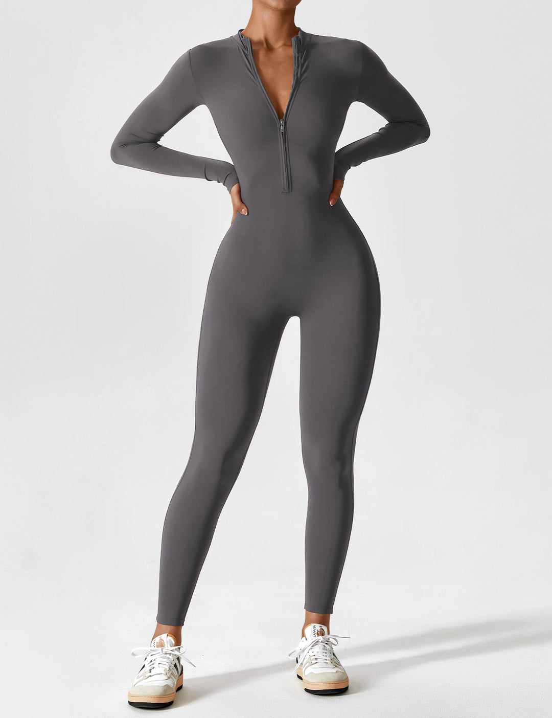 Fitted long-sleeve jumpsuit with mock neck and front zipper