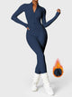 Fitted long-sleeve jumpsuit with mock neck and front zipper