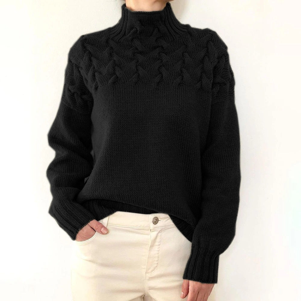 Women's cable knit turtleneck sweater with long sleeves and ribbed trims
